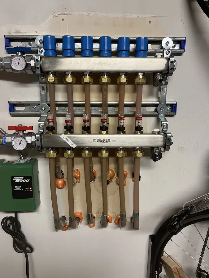 Plumber performing Gas Line Installation at a residential property in North Arlington